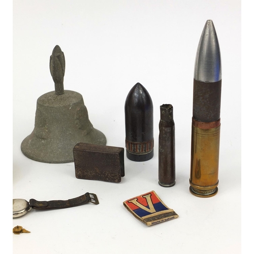 376 - Military related objects including a Buren silver cased trench watch, trench art, Carlton ware Lord ... 