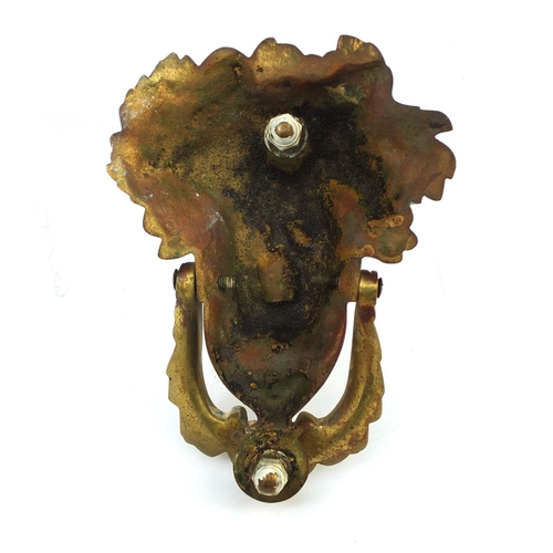 55 - Victorian brass door knocker in the form of a Maidens head, 17cm in length