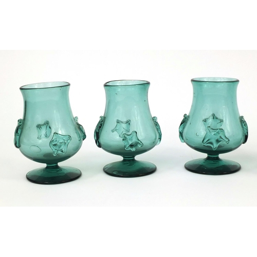 732 - Set of six bottle green glasses with applied decoration, possibly Bohemian, each 12cm high