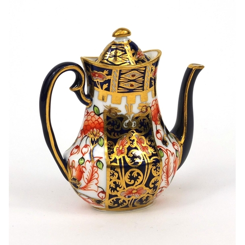 691 - Miniature Royal Crown Derby Imari pattern coffee pot, factory marks and numbered 6299 to the base, 7... 