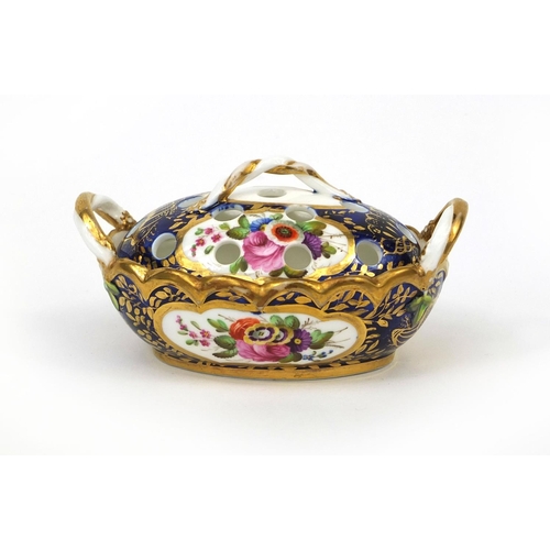 680 - Spode porcelain lidded pot pourri of basket form wit twin handles, hand painted with flowers, factor... 