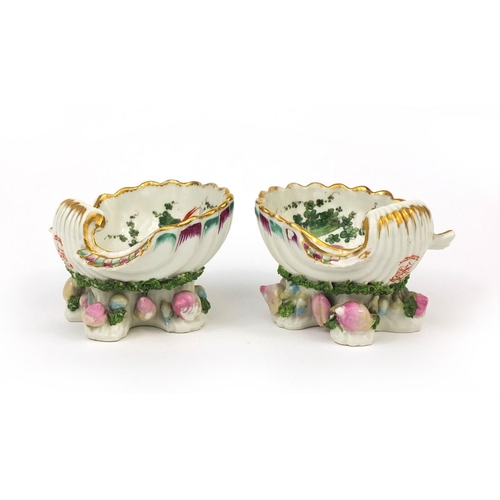 685 - Pair of Samson porcelain shell shaped salts hand painted with birds and flowers, marked Plymouth to ... 