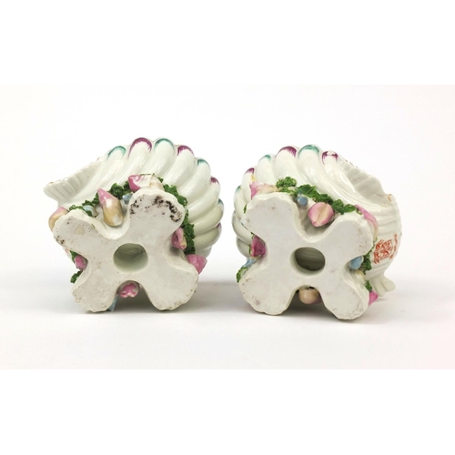 685 - Pair of Samson porcelain shell shaped salts hand painted with birds and flowers, marked Plymouth to ... 