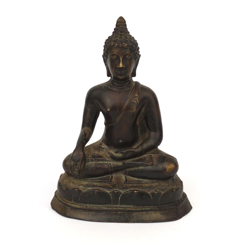 553 - Chino Tibetan bronze Buddha seated in the lotus position, 21cm high