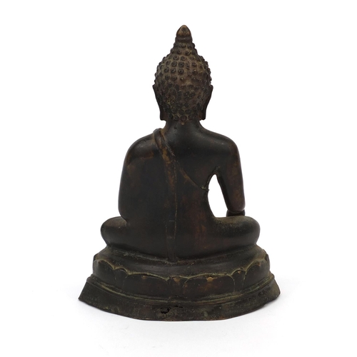 553 - Chino Tibetan bronze Buddha seated in the lotus position, 21cm high