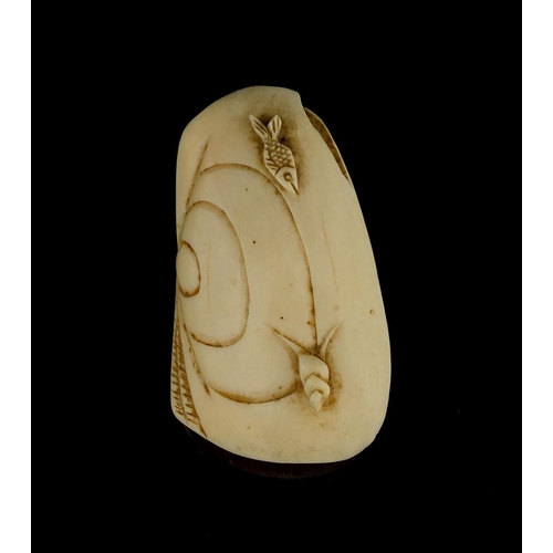 534 - Chinese ivory clam shell, the interior carved with a figure on horseback in a landscape, raised on a... 