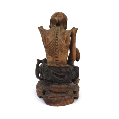 541 - Well detailed Chinese root carving of a fasting Buddha, four figure character marks to the base, 24c... 