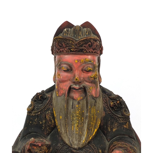 540 - Chinese wooden carving of a seated emperor wearing a dragon robe, 42cm high