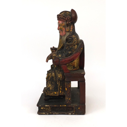 540 - Chinese wooden carving of a seated emperor wearing a dragon robe, 42cm high