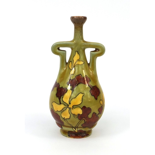 794 - Continental pottery vase with twin handles, hand painted with stylised flowers, numbered 6230 to the... 