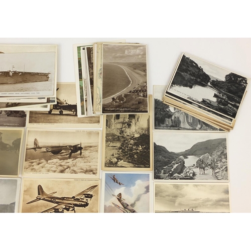 207 - Group of Military interest and topographical postcards and photographs including tanks, buses and ba... 