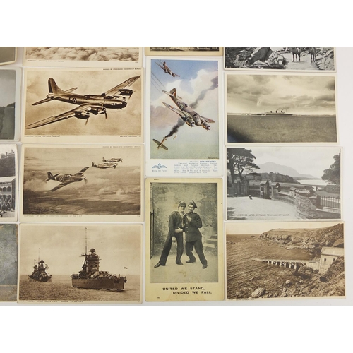 207 - Group of Military interest and topographical postcards and photographs including tanks, buses and ba... 