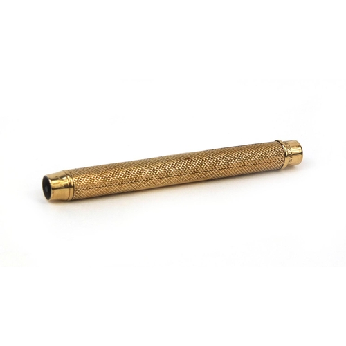 121 - S Mordan & Co 9ct gold propelling pencil retailed by Apsrey, with engine turned decoration and bank ... 