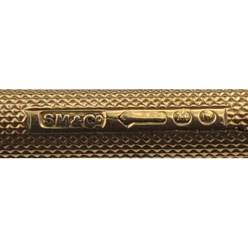 121 - S Mordan & Co 9ct gold propelling pencil retailed by Apsrey, with engine turned decoration and bank ... 