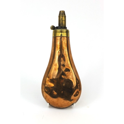 382 - 19th century copper and brass powder flask embossed with a hunting scene, 21cm in length