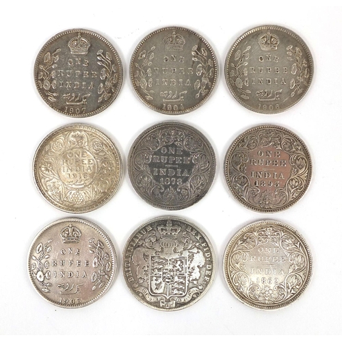 308 - Eight British colonial Indian one rupees, together with an 1829 George IV silver half crown, the rup... 