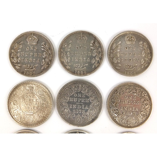 308 - Eight British colonial Indian one rupees, together with an 1829 George IV silver half crown, the rup... 