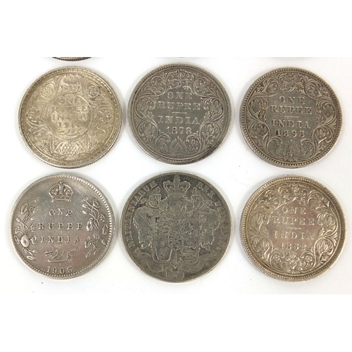 308 - Eight British colonial Indian one rupees, together with an 1829 George IV silver half crown, the rup... 