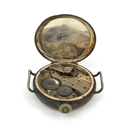 368 - Military interest silver cased trench watch with luminous hands, numbered 24023 to the interior, 3.3... 