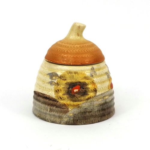 756 - Clarice Cliff Newport pottery honey pot and cover, factory marks to the base, 11cm high