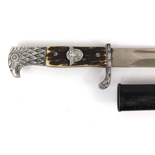 394 - German Military interest police dress bayonet and scabbard, marks to the blade, 39cm in length