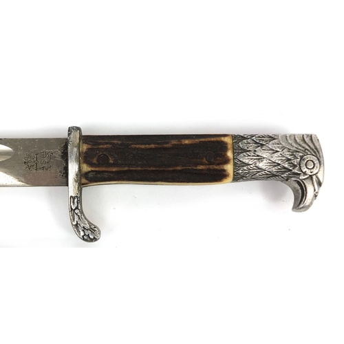 394 - German Military interest police dress bayonet and scabbard, marks to the blade, 39cm in length