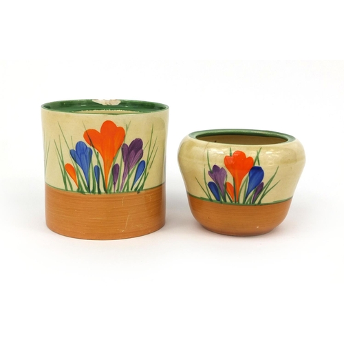 755 - Two Clarice Cliff crocus pattern pots, including a cylindrical example, each with factory marks to t... 