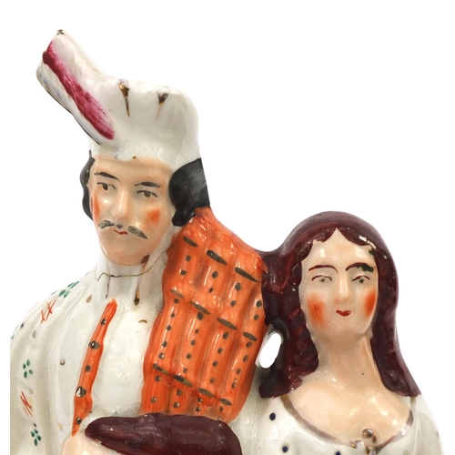 707 - Five Victorian Staffordshire pottery figure groups including Highland dancer clock example and a Sta... 