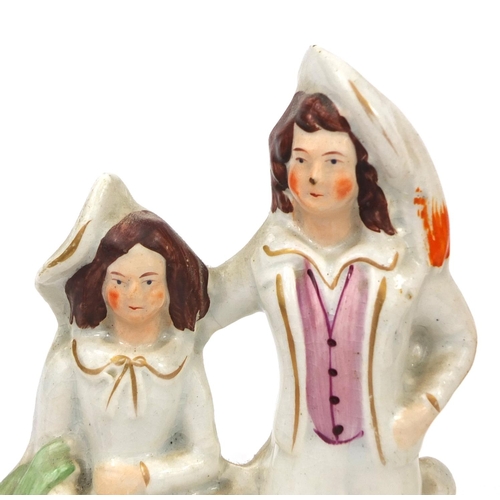 707 - Five Victorian Staffordshire pottery figure groups including Highland dancer clock example and a Sta... 