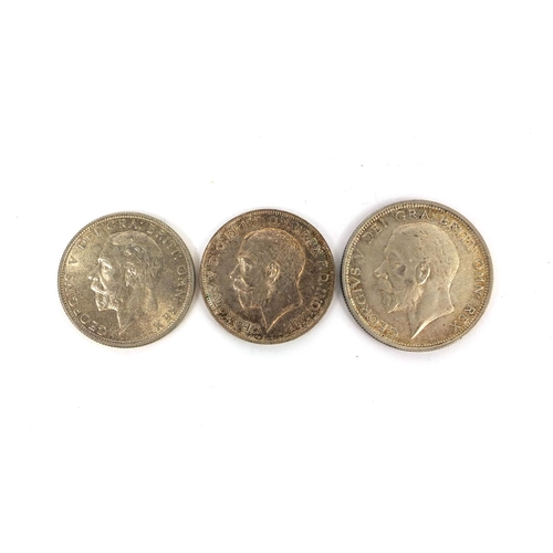 294 - Three George V coins comprising 1927 half crown and two florins 1918 and 1936, approximate weight 36... 