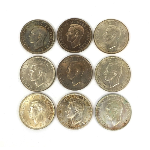 296 - Nine George VI half crowns comprising dates 1937,1939, 1940 1942, 1944, 1945, 1946, 1948 and 1950