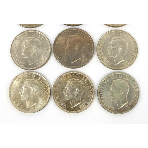 296 - Nine George VI half crowns comprising dates 1937,1939, 1940 1942, 1944, 1945, 1946, 1948 and 1950