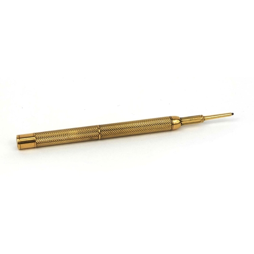 122 - S Mordan & Co unmarked gold propelling pencil with engine turned decoration and hardstone end, 7.3cm... 