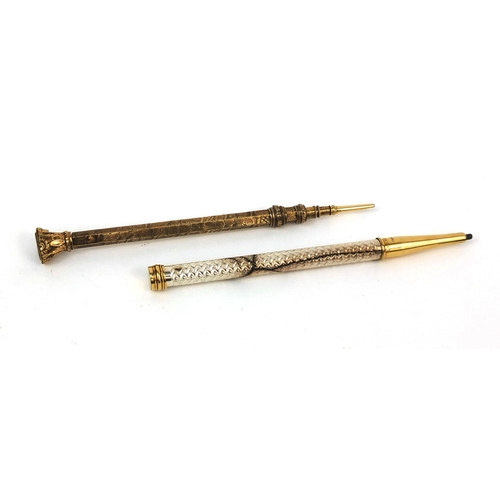 126 - Two propelling pencils comprising L & C Hardtmuth of Paris and a gold coloured metal example with ch... 