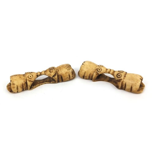 610 - Two ethnic bone elephant carvings, each 9.5cm wide