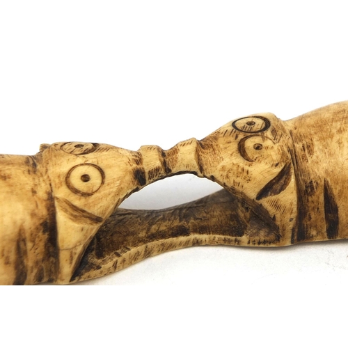 610 - Two ethnic bone elephant carvings, each 9.5cm wide