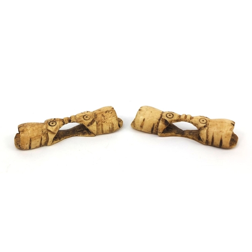 610 - Two ethnic bone elephant carvings, each 9.5cm wide