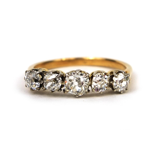 914 - Unmarked gold diamond five stone ring, size O, approximate weight 3.0g