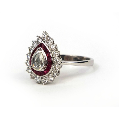 943 - 18ct white gold pear shaped diamond and ruby cluster ring, size M, approximate weight  3.7g