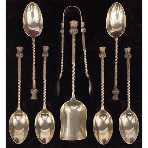 848 - Cased set of six Victorian Scottish silver teaspoons, sugar tongs and sugar spoon, each with thistle... 