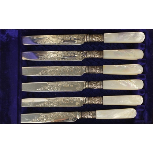 858 - Canteen of six silver Victorian Mother of Pearl fish knives and forks, each with floral chased decor... 