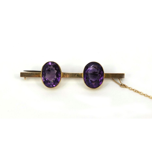 992 - 9ct gold amethyst bar brooch, 5.5cm long, approximate weight 7.3g