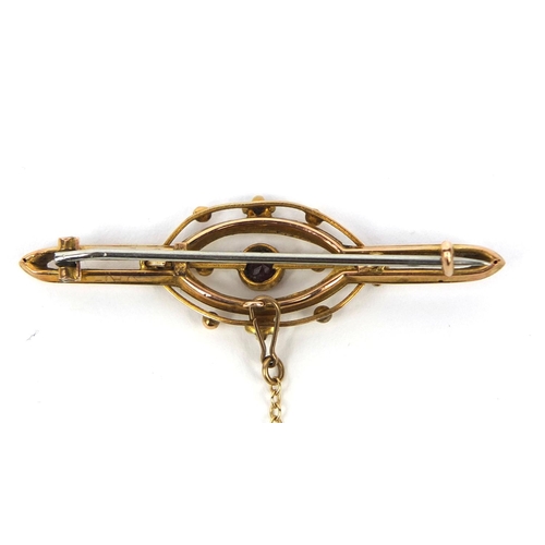 996 - 9ct gold garnet and seed pearl bar brooch, 5cm long, approximate weight 2.7g