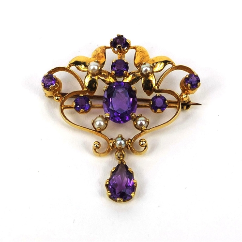 928 - Art Nouveau 9ct gold amethyst and seed pearl pendant/brooch, 4.5cm long, approximate weight 6.2g