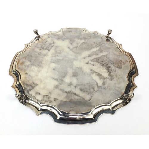 810 - Large Mappin & Webb silver four footed salver, Sheffield 1938, 35.5cm in diameter, approximate weigh... 