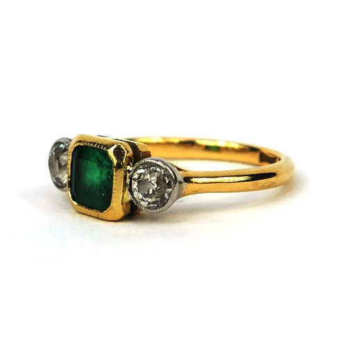 917 - 18ct gold emerald and diamond ring, set with a square cut emerald and two solitaire diamonds, size M... 