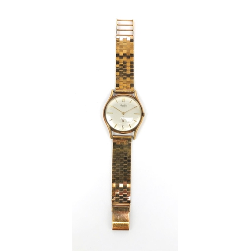 1047 - 9ct gold gentleman's Bentima wristwatch with 9ct gold strap, 3.5cm in diameter excluding the crown, ... 