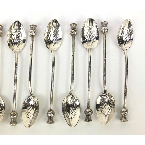 884 - Set of twelve silver teaspoons with thistle terminals, each stamped Kirkpatrick sterling, 12.5cm lon... 