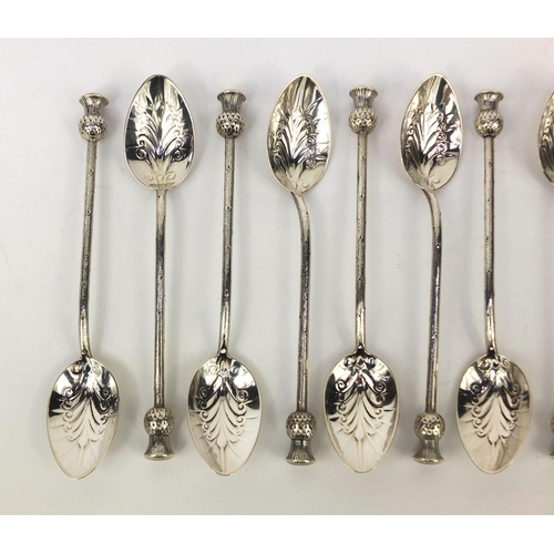 884 - Set of twelve silver teaspoons with thistle terminals, each stamped Kirkpatrick sterling, 12.5cm lon... 