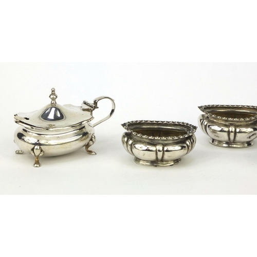 873 - Five silver cruet items comprising three open salts, mustard with hinged lid and miniature castor, v... 